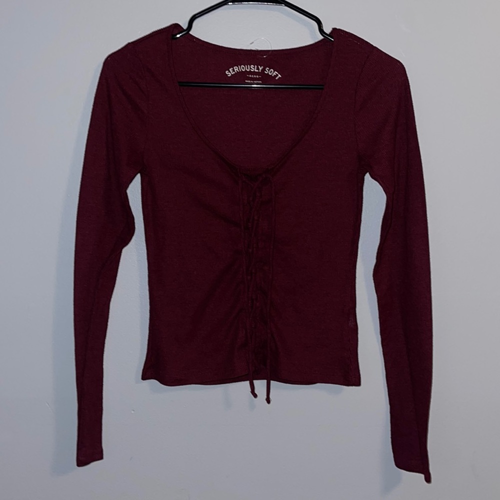Aero Postale maroon longsleeve top with a tie in the front size medium